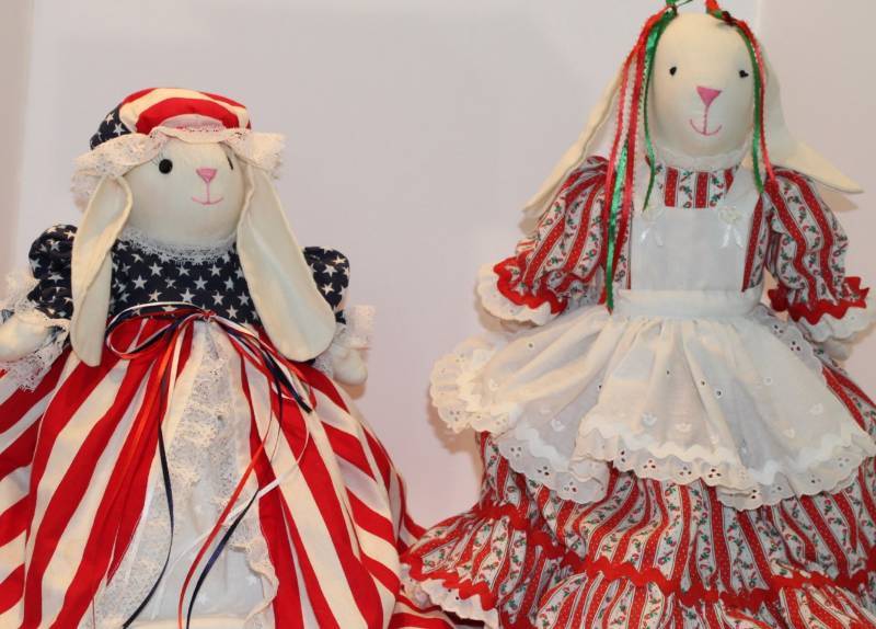 lot 1338 image: Two Reversible Holiday stuffed Bunnies