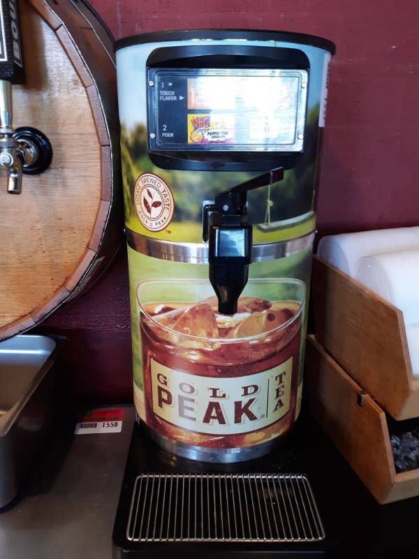 lot 1557 image: Gold Peak Iced Tea Brewer  Dispenser with flavor and water model # WB11F11321