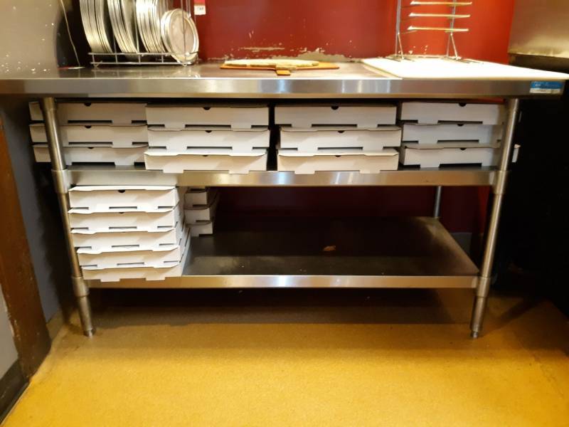 lot 1563 image: Stainless Steel Table with 2 Shelves, pizza stand, and cutting board