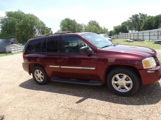 lot 342 image: 2002 GMC Envoy SCT. new tires, new brakes, AC works, Heated seats, bose stereo.