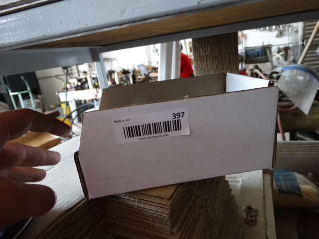 lot 397 image: Stack of fold up boxes.