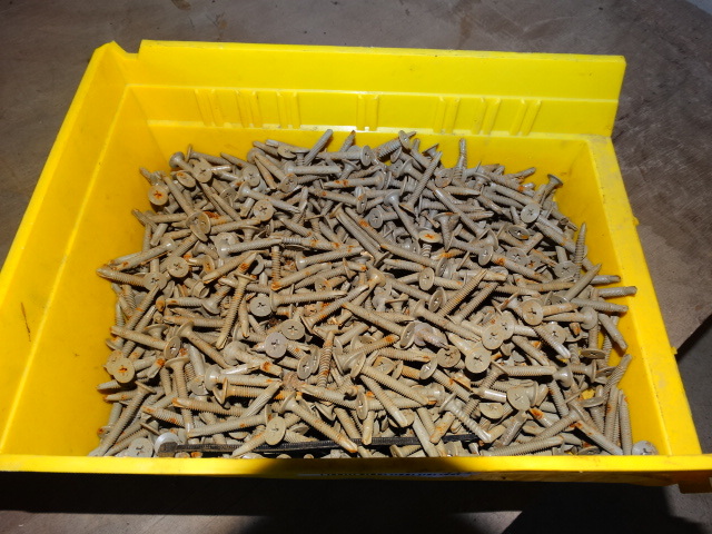 lot 411 image: Wood trailer decking screws.