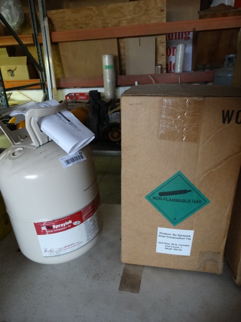 lot 458 image: Nuspraylok adhesive. 2 28lbs canisters.