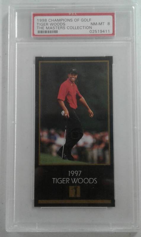 lot 1011 image: Professionally Graded PSA 8 1998 Tiger Woods Rookie Card Champions of Golf Masters Collection Extremely Good Condition