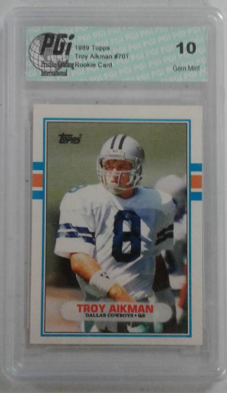 lot 1035 image: Gem MInt 10 Professionally Graded Troy Aikman 1989 Topps Traded Rookie Card Off-Grade Company