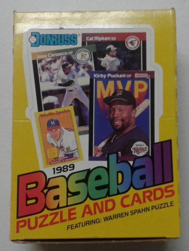 lot 1036 image: Mint Condition 1989 Donruss Wax Box with 36 Sealed Baseball Card Packs with Possible Rookies of Hall of Famers Ken Griffey, Randy Johnson, John Smoltz, Craig Biggio & More