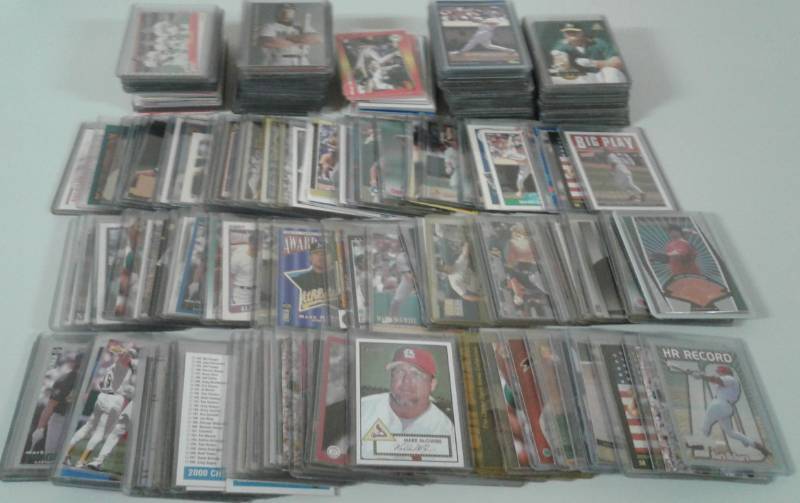 lot 1097 image: Massive Collection of Over 200 Mark McGwire Baseball Cards with Inserts - Both Oakland As & St. Louis Cardinals