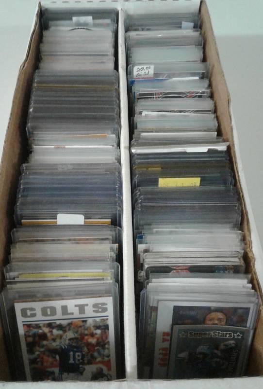 lot 1098 image: Two Row Shoebox Full of Top Loaded & Penny Sleeved Sports Cards - Football, Baseball, Basketball - No Commons, All Stars, Rookies, Inserts, Hall of Famers - Vintage 1980s to 2017 Inserts - 20 Photos