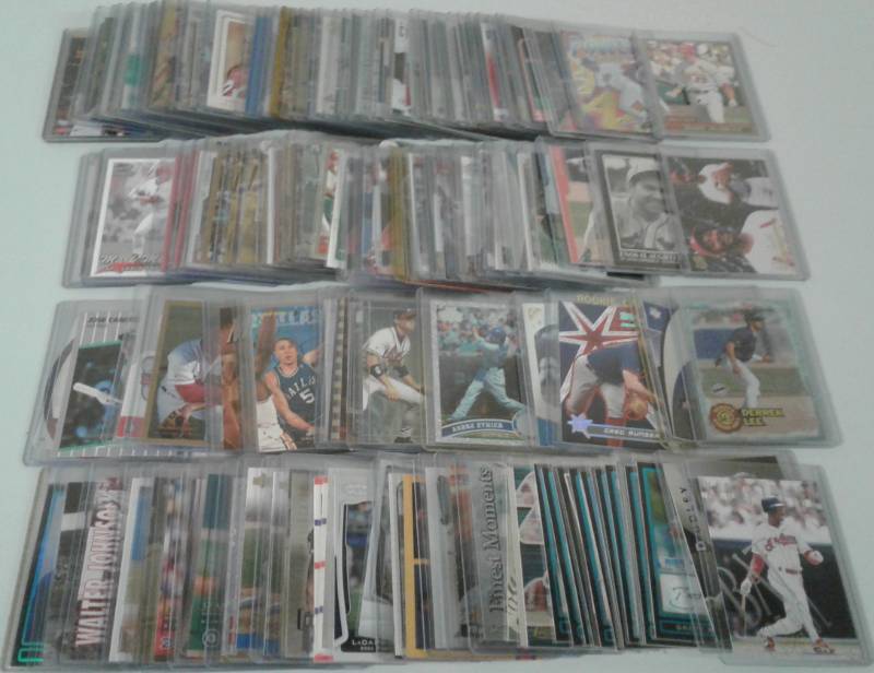 lot 1100 image: Two Row Shoebox Full of Top Loaded & Penny Sleeved Sports Cards - Football, Baseball, Basketball - No Commons, All Stars, Rookies, Inserts, Hall of Famers - Tons of Photos - George Brett, Favre, Larry Bird, Frank Thomas 