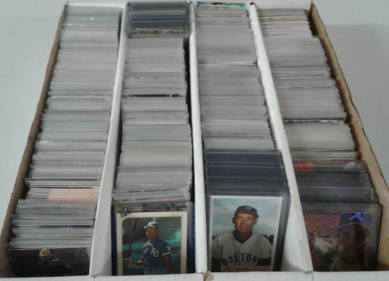 lot 1105 image: Four Row Box of Random Sports Cards Loaded With Star Cards, Rookies, All Three Major Sports - Unpicked Box of Sports Cards