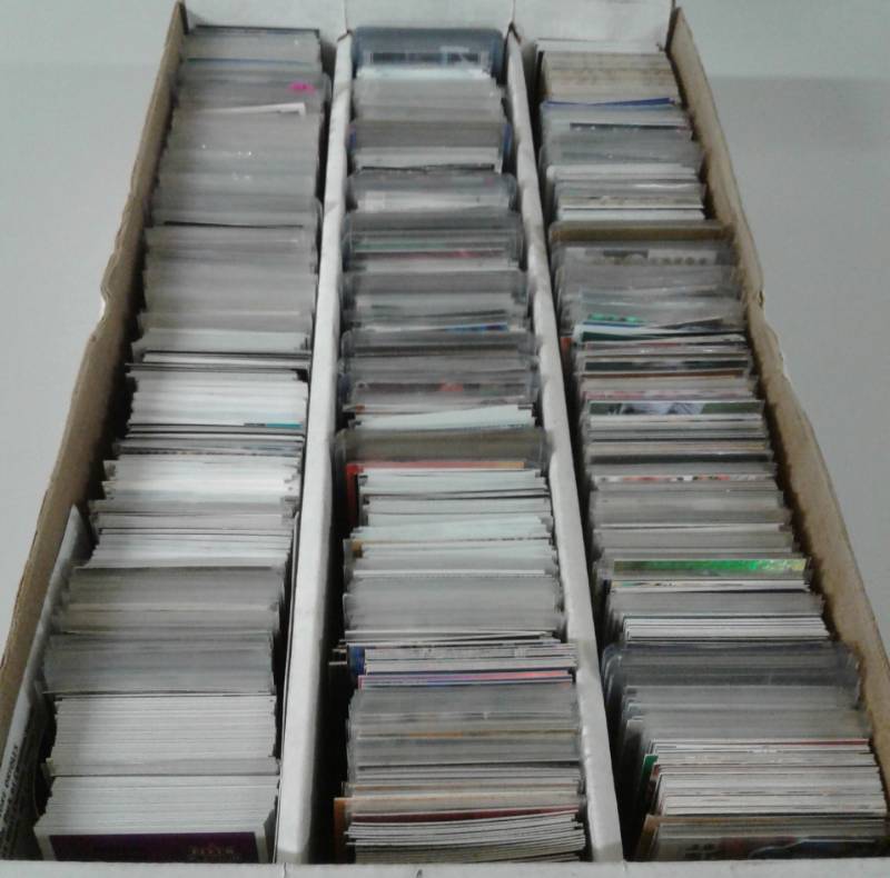 lot 1111 image: Three Row Box of Random Sports Cards Loaded With Star Cards, Rookies, All Three Major Sports - Unpicked Box of Sports Cards