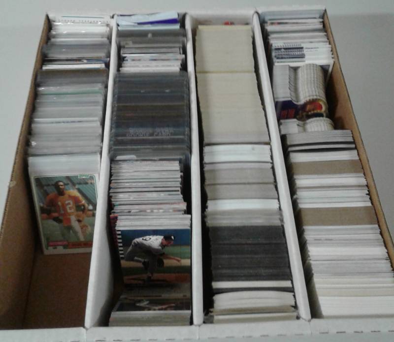 lot 1112 image: Four Row Box of Random Sports Cards Loaded With Star Cards, Rookies, All Three Major Sports - Unpicked Box of Sports Cards