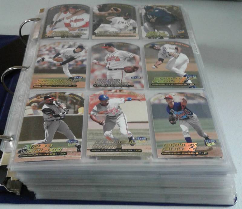lot 1169 image: Binder Full of Baseball Cards & More Including Several Hundred Ken Griffey Jr and Frank Thomas Inserts & Base Cards - Over 30 Pictures