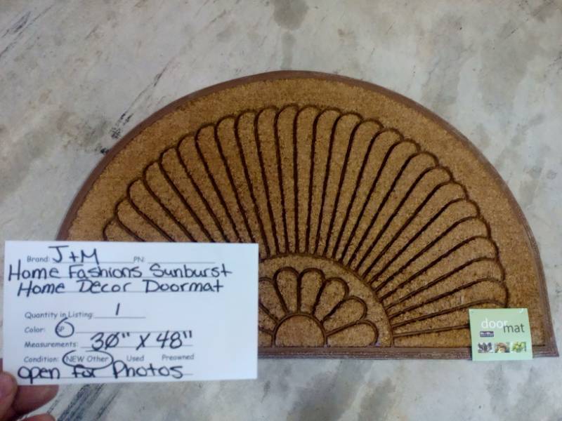lot 98 image: JM Home Fashions Sunburst Home Decor Doormat