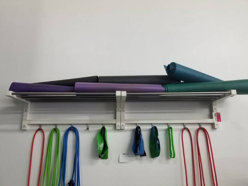 lot 1833 image: 2 Shelves With Yoga Mats