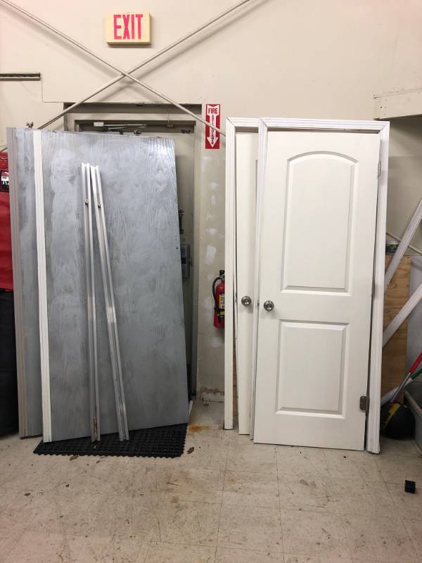 lot 9018 image: 2 sliding barn doors with hardwood, 2 misc doors&nbsp