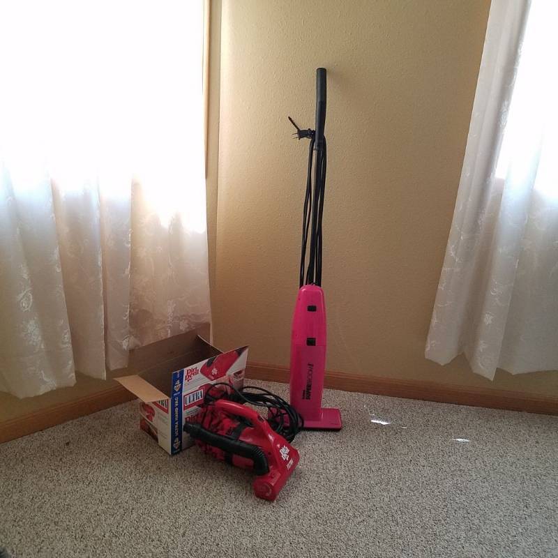 lot 6985 image: two vacuums