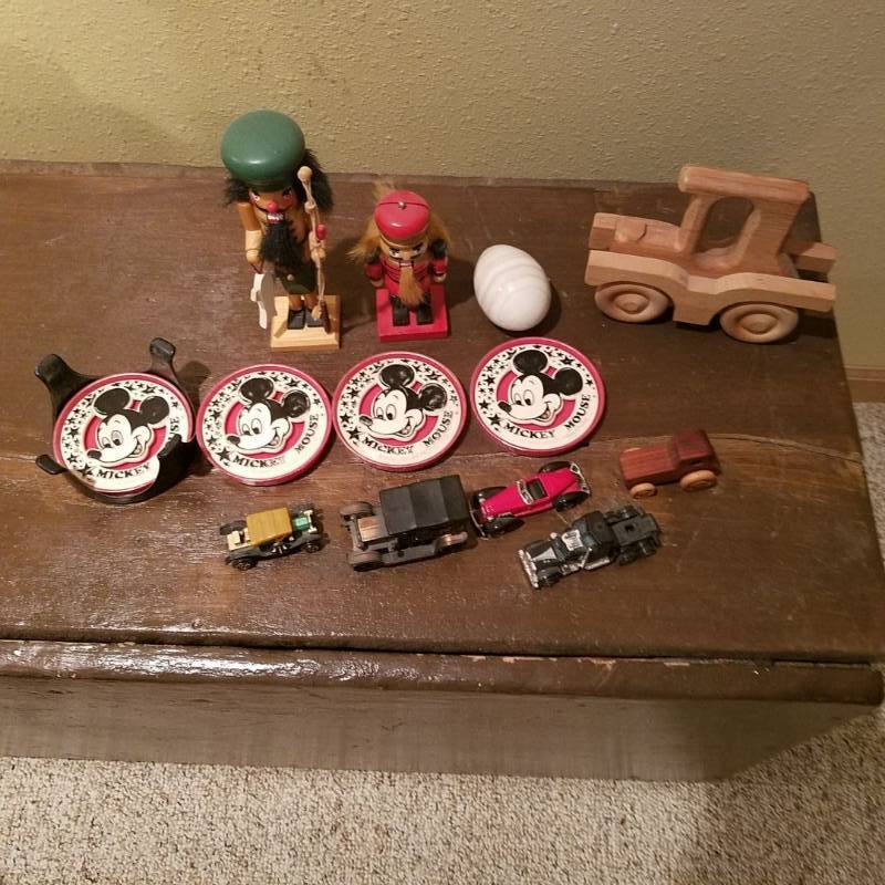 lot 7016 image: Mickey Mouse coasters, nutcrackers, trucks