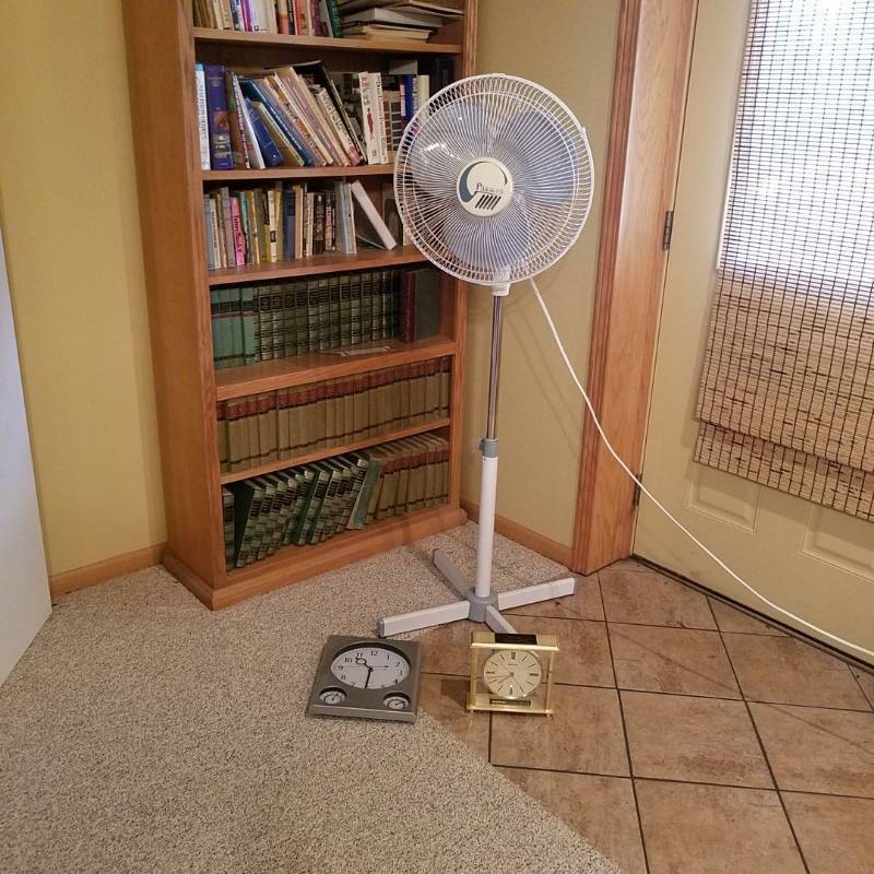 lot 7021 image: fan and two clocks
