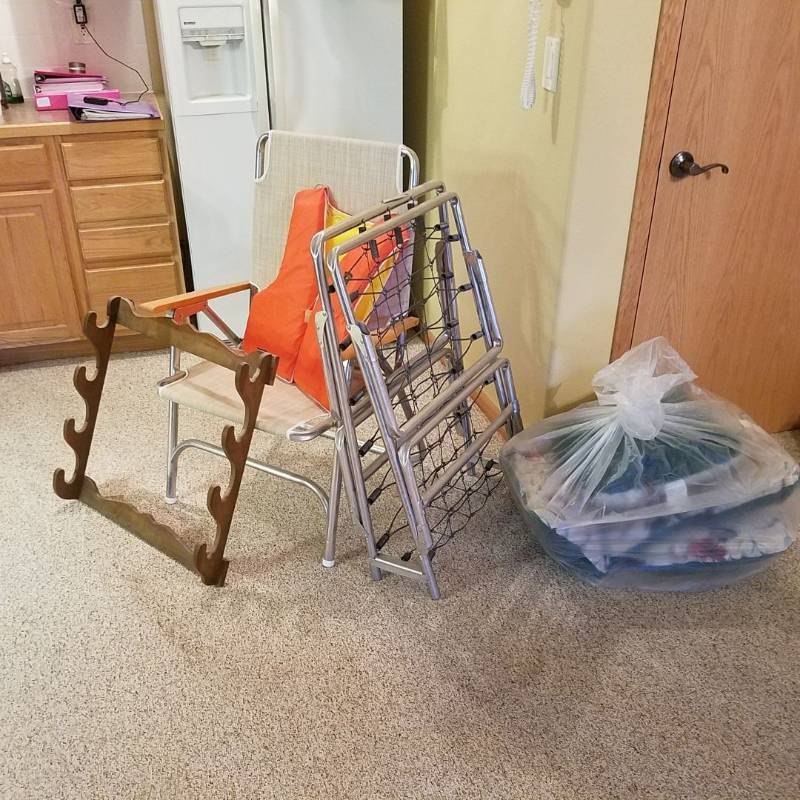 lot 7024 image: gun rack, lawn chair, life jacket, cot, cushions