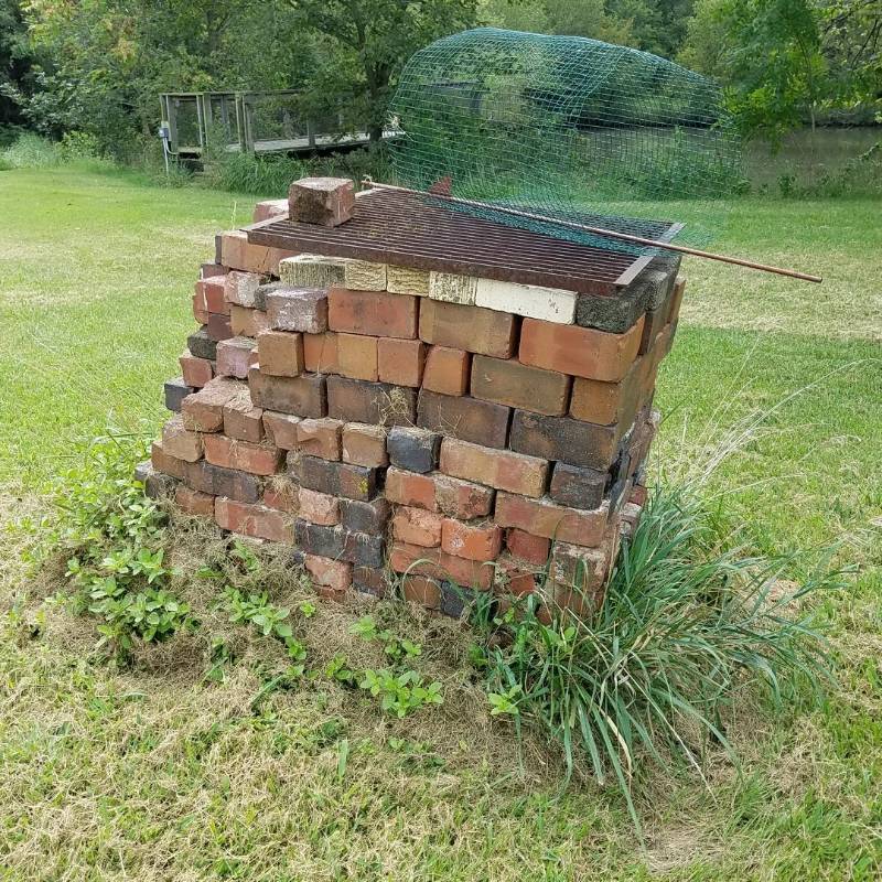 lot 7030 image: Bricks and grate
