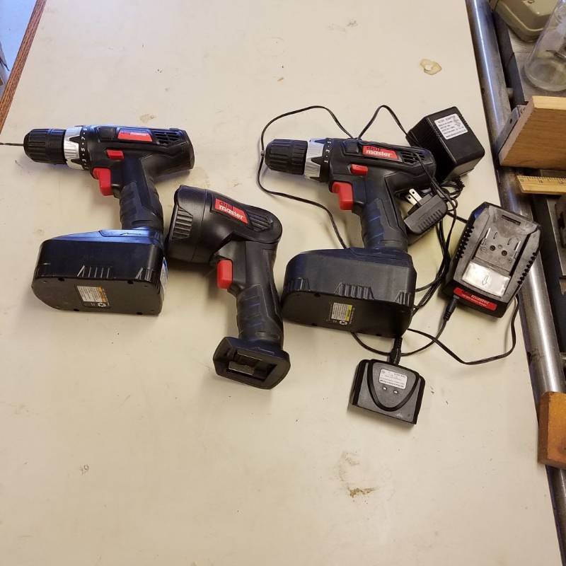 lot 7068 image: 2 Drill Master drill and a flashlight with charger, two batteries