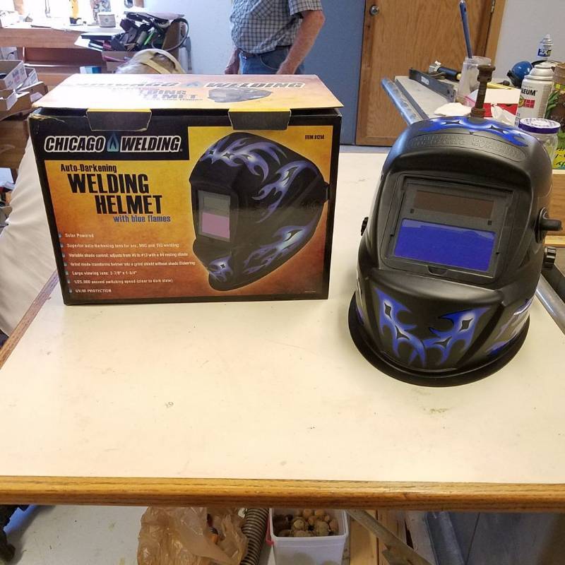 lot 7084 image: Auto Darkening Welding Helmet with Blue Flame Design