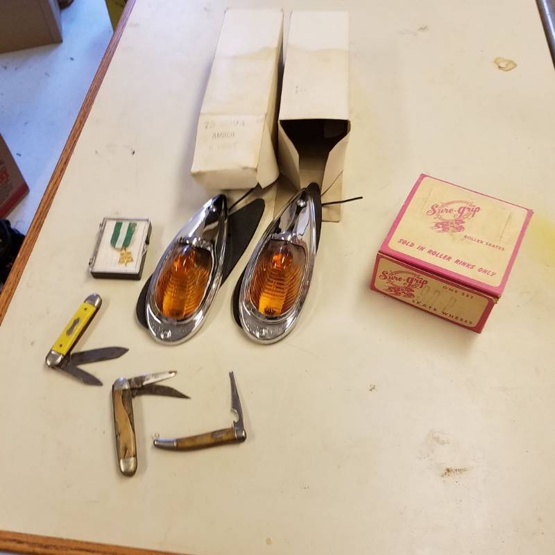 lot 7102 image: teardrop clearance lights, pocket knives, Sure Grip roller skate wheels