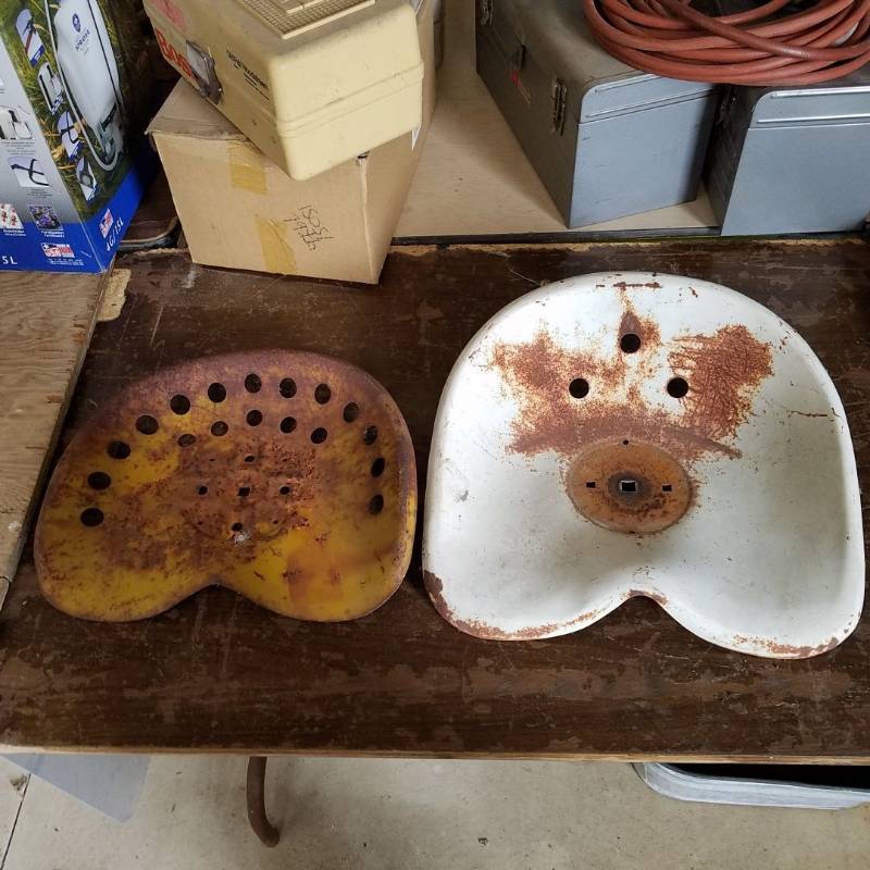lot 7116 image: 2 metal tractor seats