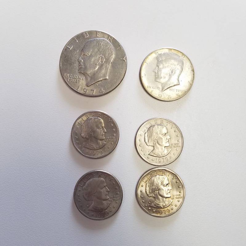 lot 7157 image: 4 - 1979 Susan B Anthony Dollars, 1974 Eisenhower dollar, 1965 Kennedy half dollar