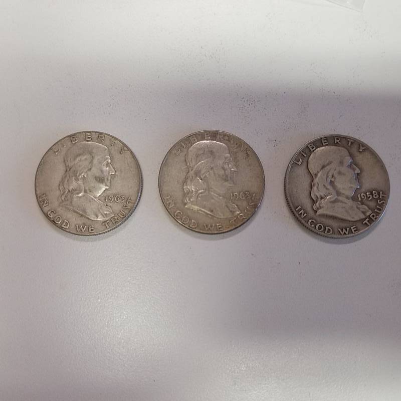 lot 7199 image: 3 Franklin half dollars- 1963 D, 1963 D, 1958 d