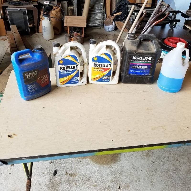 lot 7248 image: oil, hydraulic fluid, transmission fluid, and washer fluid - all about half full