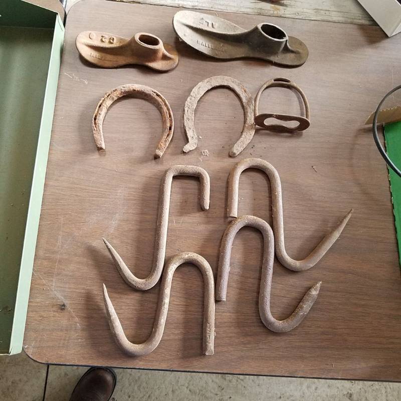 lot 7260 image: meat hooks, horseshoes, shoe last tops