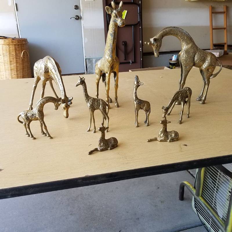 lot 7305 image: assorted brass giraffes