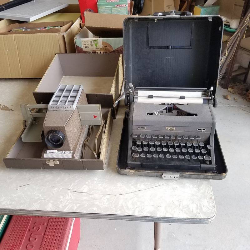 lot 7316 image: typewriter and projector - projector screen included but not pictured