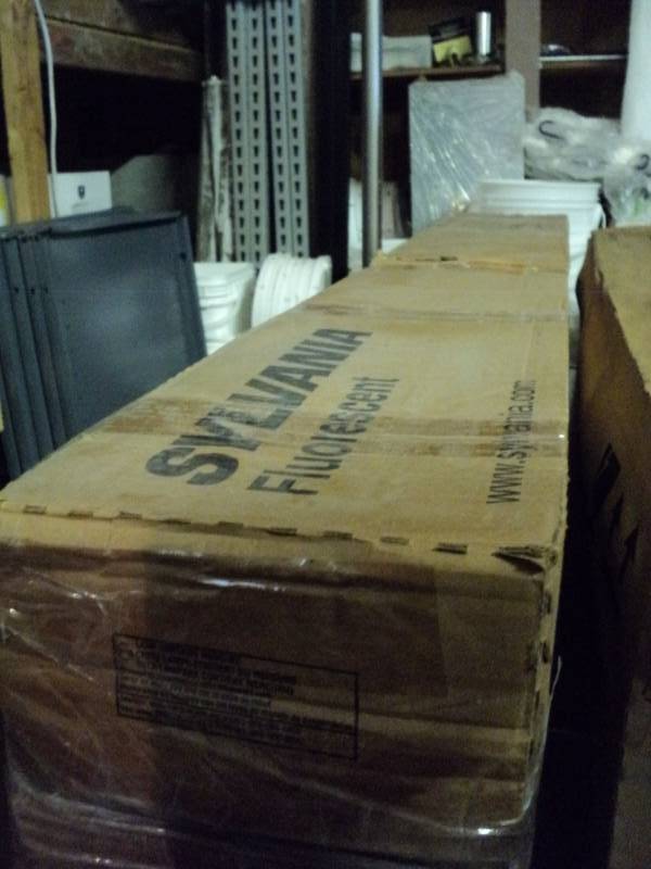 lot 9099 image: (1) box Sylvania Fluorescent Bulbs, single pin F60T12CW, 30 bulbs in package, package has water damage