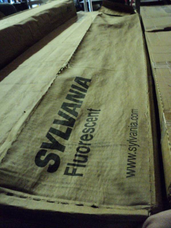 lot 9100 image: (1) box Sylvania Fluorescent Bulbs, single pin F60T12CW, 29 bulbs in package, package has water damage