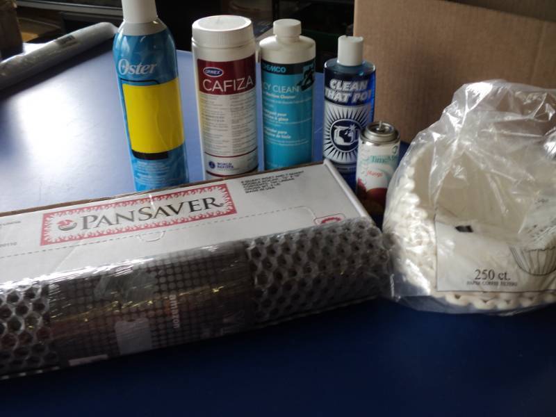 lot 8380 image: (8) ct mixed lot kitchen cleaners, coffee filters, pan liners, dish mats