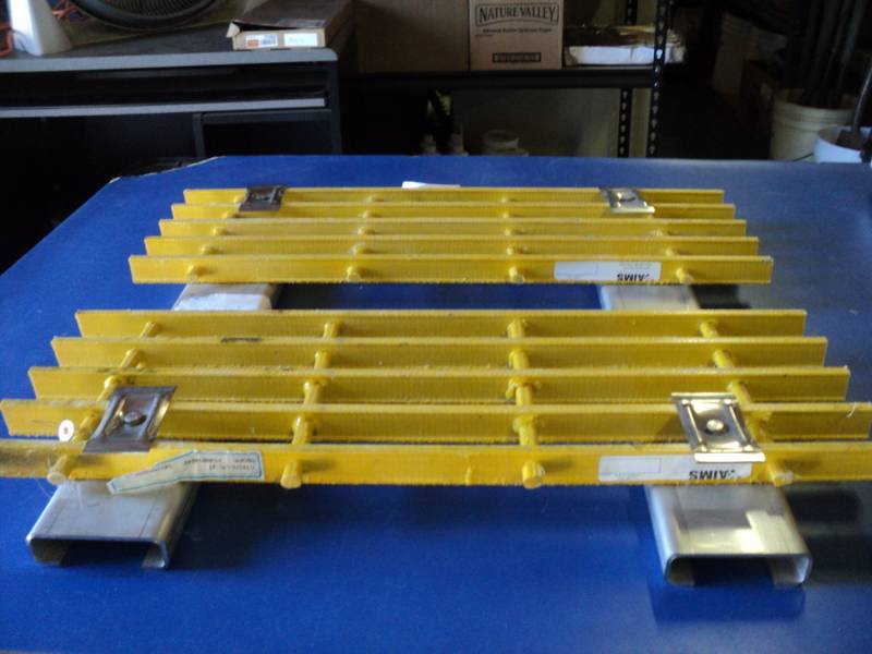 lot 9176 image: Steel grate 002 JC21 E06656, 2 x 2