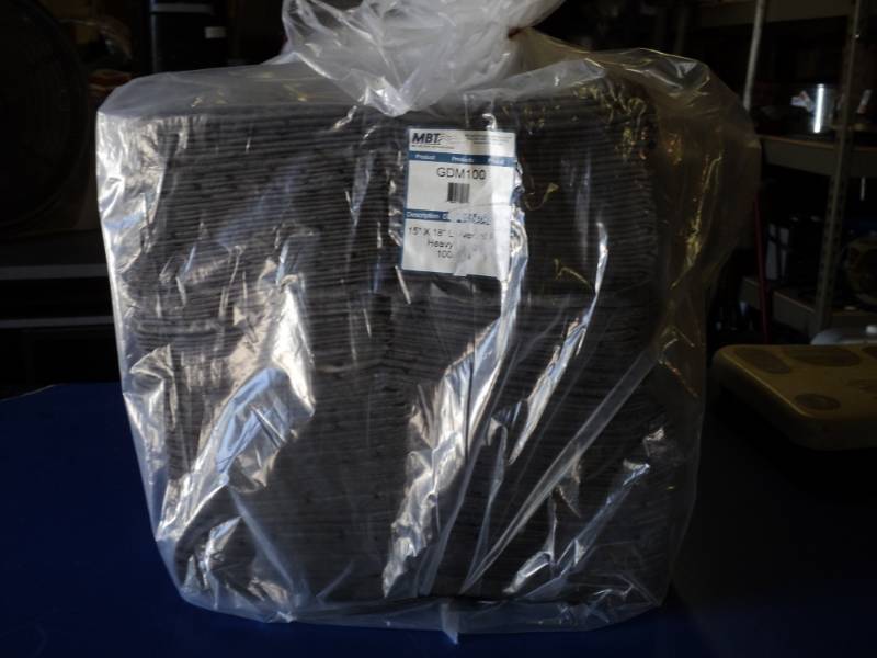 lot 9194 image: (1) package of (100) MBT Oil Absorbing pads, 15 x 18, gray