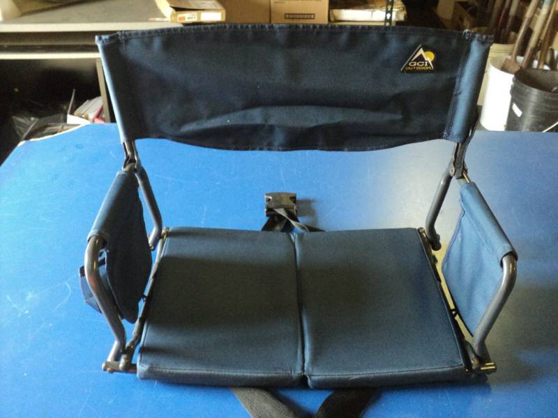 lot 9217 image: GCI Outdoor brand folding stadium Chair, straps to bleacher or bench, used