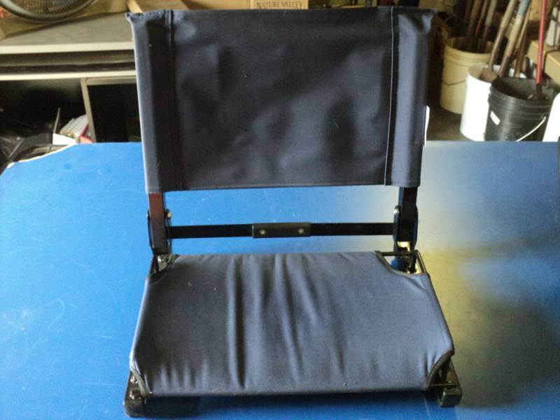 lot 9218 image: Stadium Chair Brand folding stadium chair, blue, used