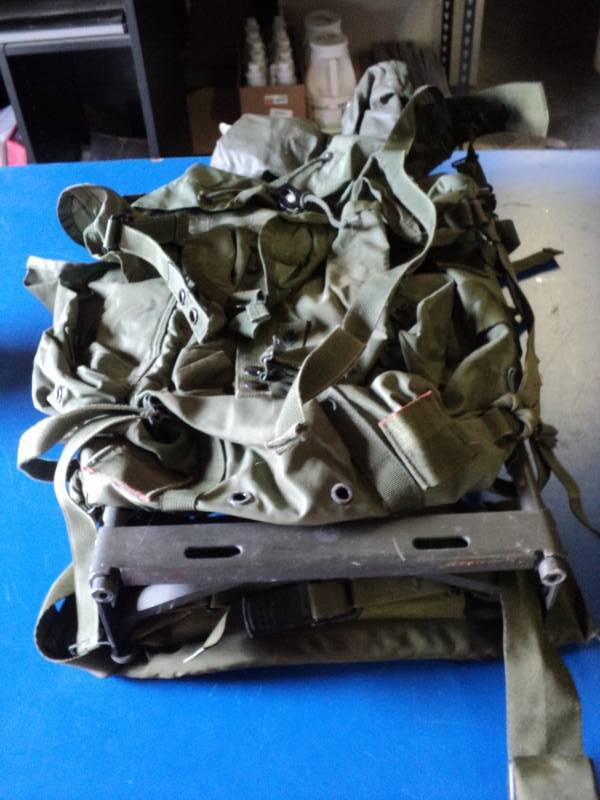 lot 9235 image: Military style frame backpack, olive drab, used