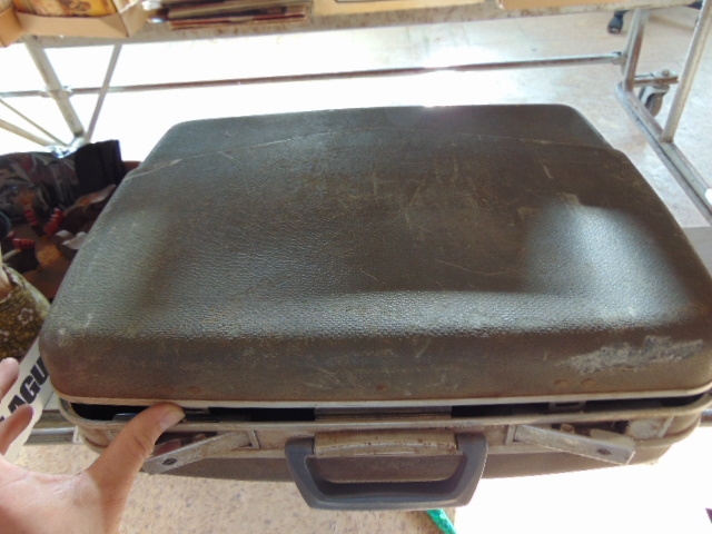 lot 18801 image: Nice suit case full of cords