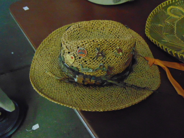 lot 18983 image: cowboy hat with a variety of pins