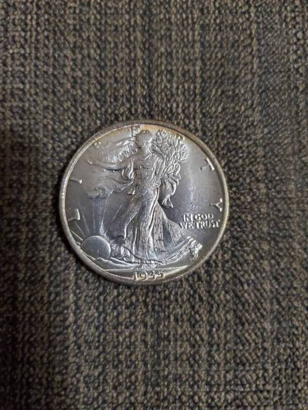 lot 7909 image: 1935 Walking Liberty Half Dollar
