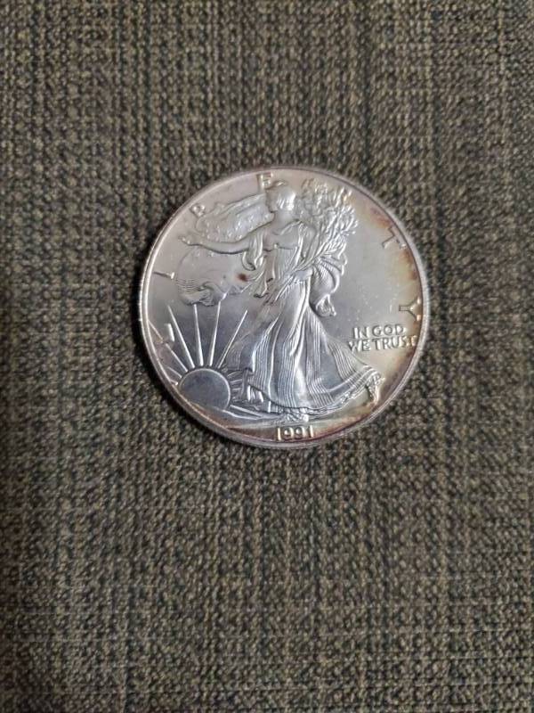 lot 7873 image: 1991 Silver Eagle - 1 Troy Ounce .999 Fine Silver