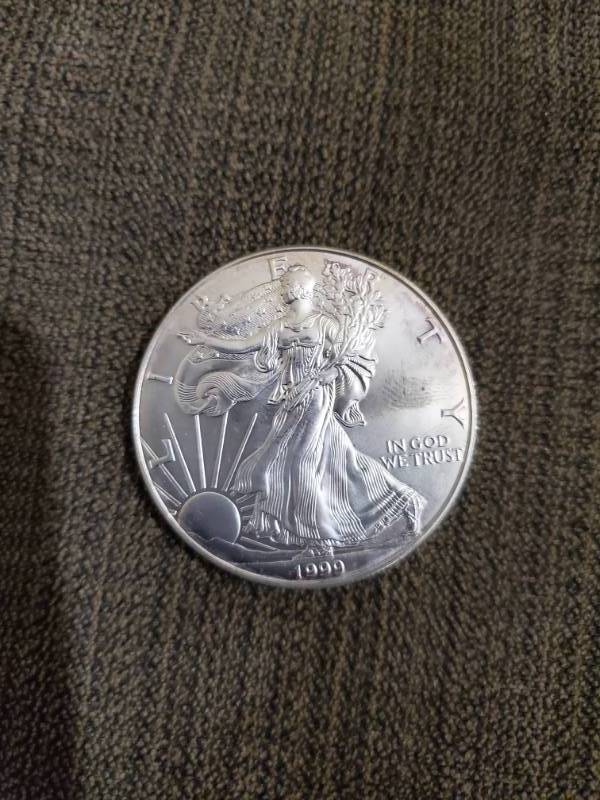 lot 6941 image: 1999 Silver Eagle - 1 Troy Ounce .999 Fine Silver