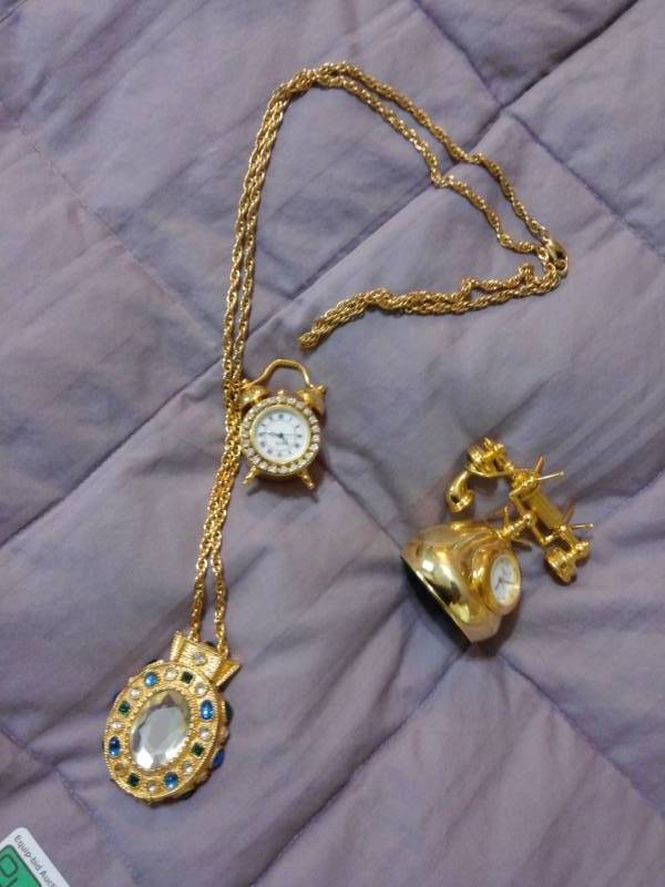 lot 7853 image: Telephone, Alarm Clock, Necklace with Pendant Fashion Jewelry