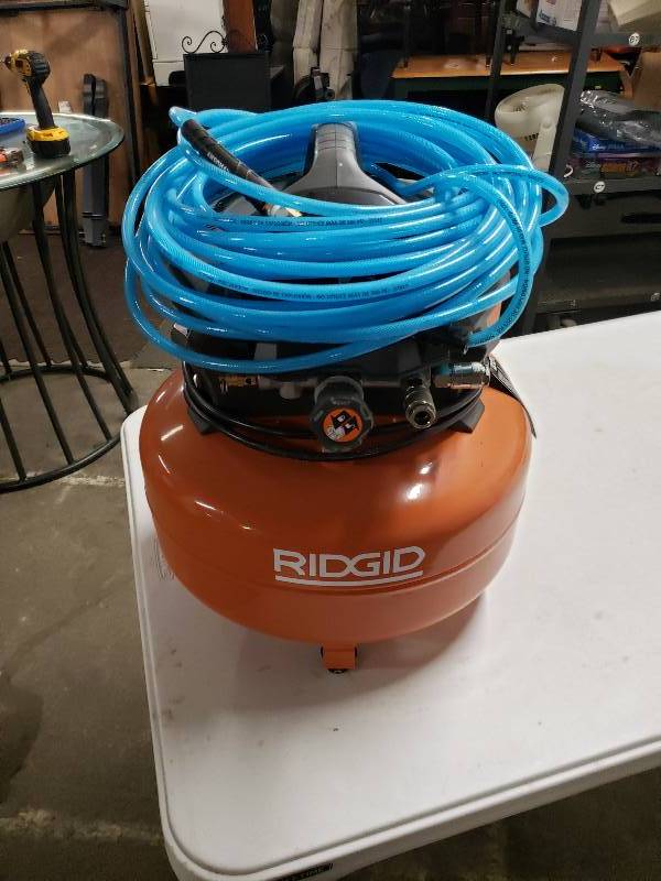 lot 2383 image: Ridgid OF60150HB 6 Gal. Portable Electric Pancake Air Compressor
